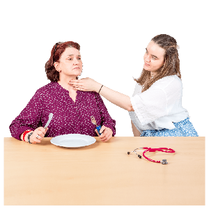 Medical staff checking someone's throat
