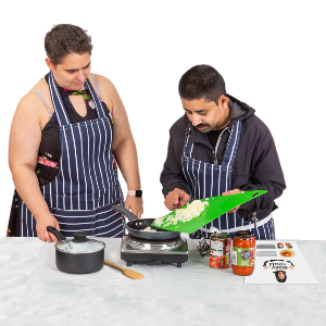 2 people preparing food together